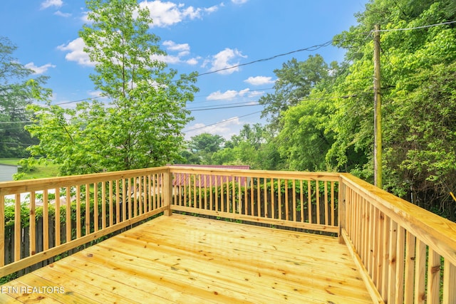 600 N Trinity Ave, Rockwood, TN 37854 - wooden deck with view of wooded area