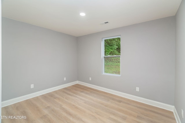 600 N Trinity Ave, Rockwood, TN 37854 - empty room featuring baseboards, light wood-style floors, and recessed lighting
