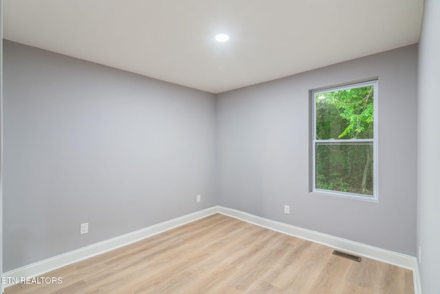600 N Trinity Ave, Rockwood, TN 37854 - empty room featuring light wood-style flooring, baseboards, and recessed lighting
