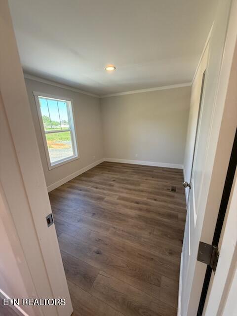 7922 Harmon Rd, Powell, TN 37849 - unfurnished room with ornamental molding, wood finished floors, baseboards, and recessed lighting