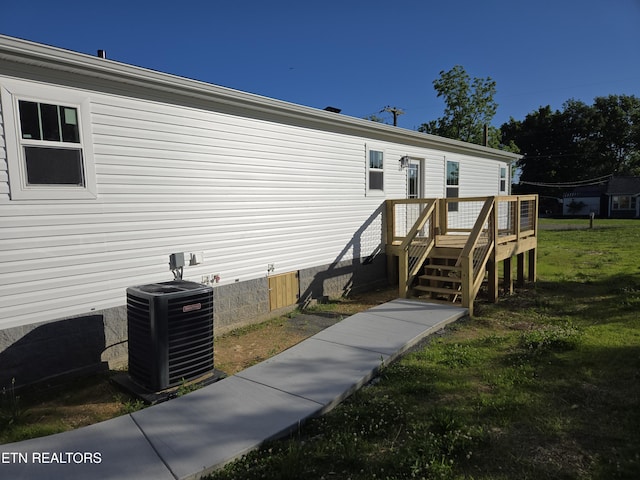 7922 Harmon Rd, Powell, TN 37849 - back of house featuring crawl space, a deck, and cooling unit
