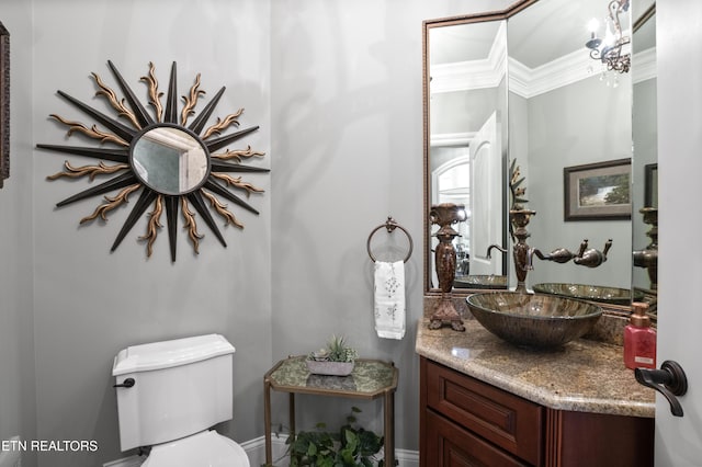 759 Indian Mountain Rd, Jellico, TN 37762 - bathroom featuring vanity, toilet, crown molding, and baseboards