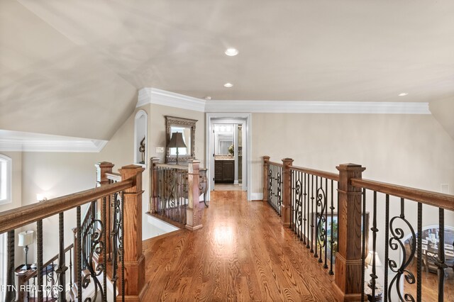 759 Indian Mountain Rd, Jellico, TN 37762 - hallway with an upstairs landing, wood finished floors, crown molding, and recessed lighting