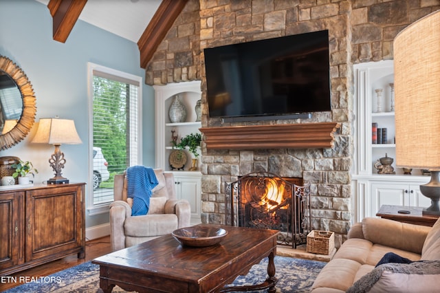 759 Indian Mountain Rd, Jellico, TN 37762 - living room featuring a fireplace, wood finished floors, baseboards, and built in features