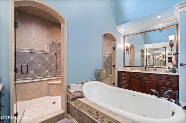759 Indian Mountain Rd, Jellico, TN 37762 - full bathroom featuring a jetted tub, a shower stall, vanity, and recessed lighting