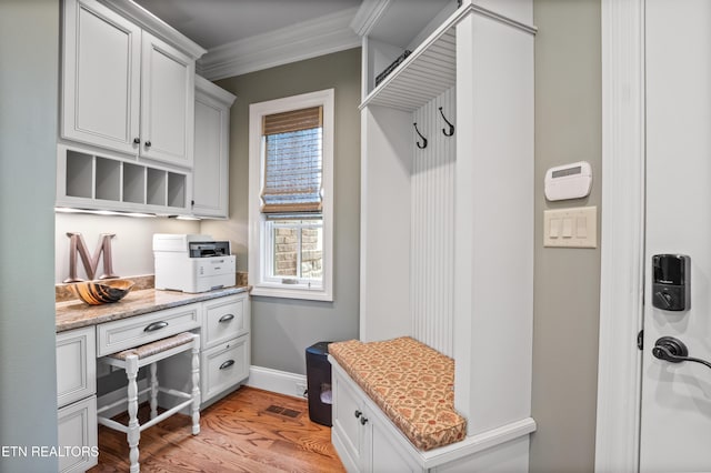 759 Indian Mountain Rd, Jellico, TN 37762 - mudroom with crown molding, light wood finished floors, and baseboards