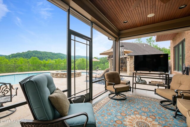 759 Indian Mountain Rd, Jellico, TN 37762 - sunroom / solarium with a hot tub