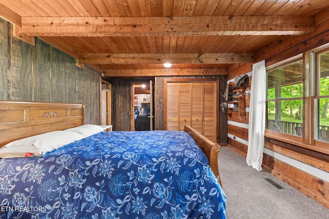 1854 Catusa Rd, Wartburg, TN 37887 - bedroom featuring wooden ceiling with exposed beams, wood walls, and carpet