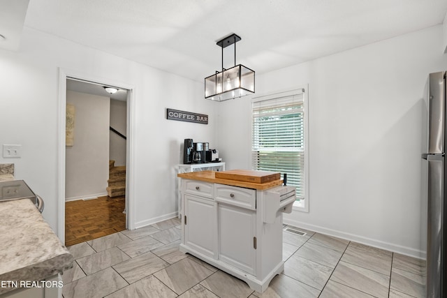 8707 Olde Colony Trl Unit 17, Knoxville, TN 37923 - dining area featuring stairway and baseboards