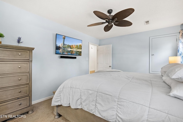8707 Olde Colony Trl Unit 17, Knoxville, TN 37923 - bedroom with light carpet, baseboards, and ceiling fan