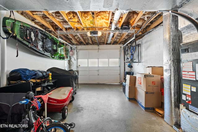 8707 Olde Colony Trl Unit 17, Knoxville, TN 37923 - garage featuring a garage door opener