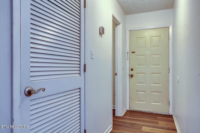 4003 Valley View Dr Unit 6, Knoxville, TN 37917 - corridor with wood finished floors, a textured ceiling, and baseboards