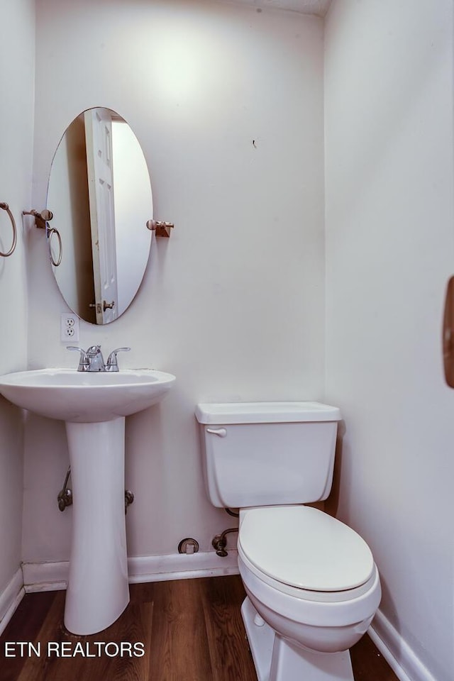 4003 Valley View Dr Unit 6, Knoxville, TN 37917 - half bath with baseboards, toilet, wood finished floors, and a sink