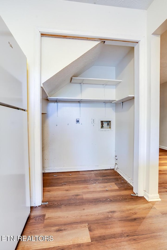 4003 Valley View Dr Unit 6, Knoxville, TN 37917 - washroom featuring washer hookup, wood finished floors, and baseboards