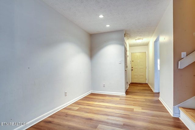 4003 Valley View Dr Unit 6, Knoxville, TN 37917 - hall featuring a textured ceiling, light wood-style floors, baseboards, and recessed lighting