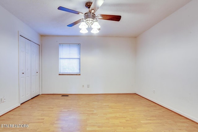 4003 Valley View Dr Unit 6, Knoxville, TN 37917 - unfurnished bedroom featuring light wood finished floors, baseboards, a closet, and a ceiling fan