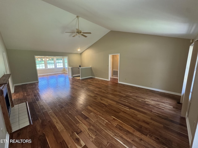 118 Toqua Club Way, Loudon, TN 37774 - unfurnished living room with a ceiling fan, dark wood-style flooring, vaulted ceiling, a fireplace, and baseboards