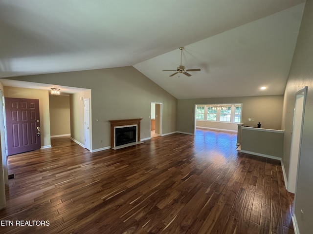 118 Toqua Club Way, Loudon, TN 37774 - unfurnished living room with dark wood finished floors, ceiling fan, vaulted ceiling, baseboards, and a fireplace with flush hearth