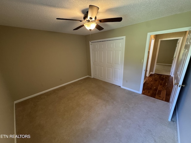 118 Toqua Club Way, Loudon, TN 37774 - unfurnished bedroom with carpet, a closet, baseboards, a textured ceiling, and ceiling fan