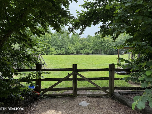 1309 Licklog Hollow Rd, Sevierville, TN 37876 - gate featuring a wooded view