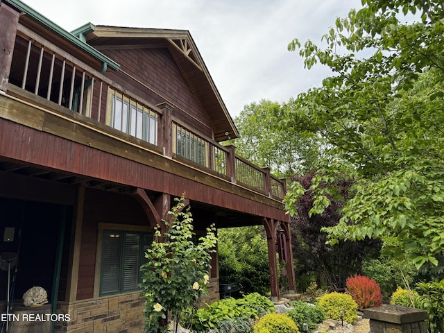 1309 Licklog Hollow Rd, Sevierville, TN 37876 - view of home's exterior with a deck and stone siding