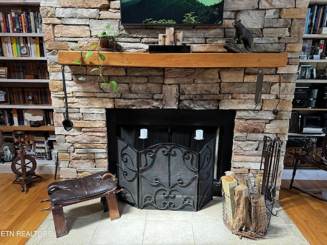 1309 Licklog Hollow Rd, Sevierville, TN 37876 - detailed view of wood finished floors and a fireplace