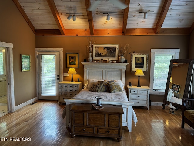 1309 Licklog Hollow Rd, Sevierville, TN 37876 - bedroom with baseboards, wooden ceiling, wood finished floors, and access to outside