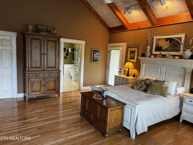 1309 Licklog Hollow Rd, Sevierville, TN 37876 - bedroom featuring wooden ceiling with exposed beams, wood finished floors, baseboards, connected bathroom, and high vaulted ceiling