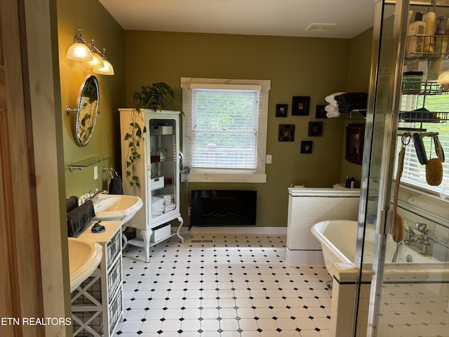 1309 Licklog Hollow Rd, Sevierville, TN 37876 - bathroom with a freestanding tub and double vanity