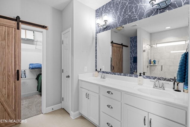 1227 Branch Creek Ln, Maryville, TN 37801 - full bath featuring a shower stall, double vanity, baseboards, tile patterned floors, and a walk in closet