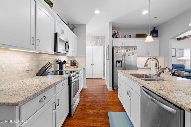 1227 Branch Creek Ln, Maryville, TN 37801 - kitchen with stainless steel appliances, a sink, dark wood-style floors, white cabinets, and recessed lighting