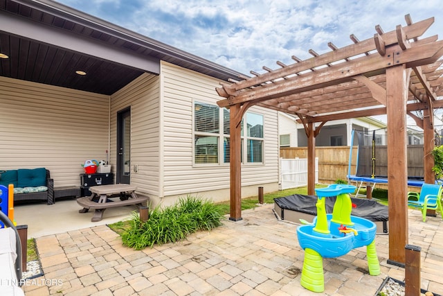 1227 Branch Creek Ln, Maryville, TN 37801 - view of patio / terrace featuring a trampoline, a pergola, and an outdoor living space