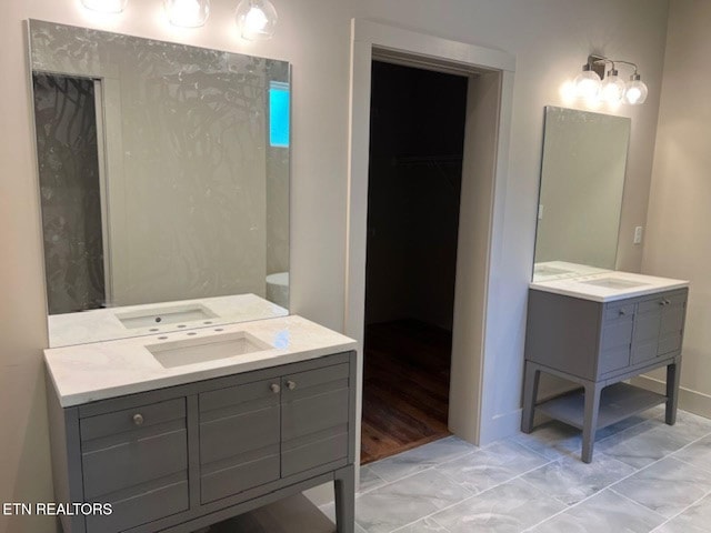110 Stone Rd, Knoxville, TN 37920 - bathroom featuring vanity and a walk in closet