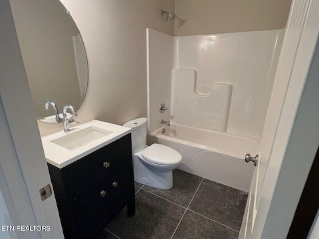 110 Stone Rd, Knoxville, TN 37920 - bathroom with vanity, tile patterned flooring, toilet, and tub / shower combination