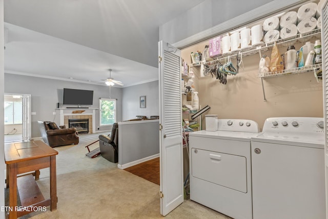 15 Breakers Ct, Clinton, TN 37716 - washroom with light colored carpet, washer and clothes dryer, ceiling fan, ornamental molding, and a tile fireplace