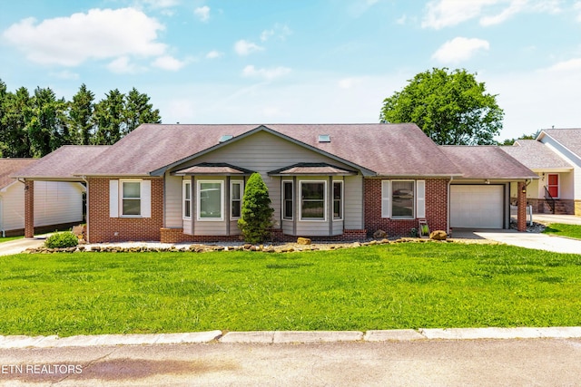 15 Breakers Ct, Clinton, TN 37716 - ranch-style home featuring concrete driveway, an attached garage, brick siding, and a front lawn