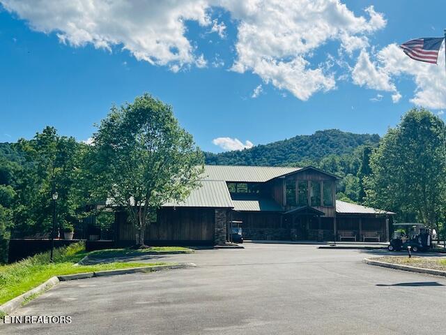405 Laurel Trace Rd, Townsend, TN 37882 - view of building exterior with uncovered parking and a mountain view