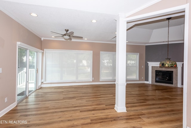 210 Oologila Pl, Loudon, TN 37774 - unfurnished living room with ceiling fan, recessed lighting, wood finished floors, a tile fireplace, and baseboards