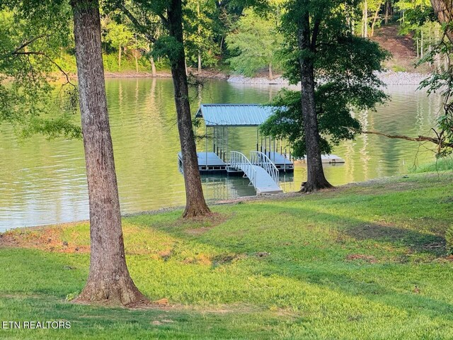 708 Lakeside Ct, Dandridge, TN 37725 - dock area with a water view and a yard