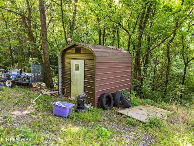 9217 Kodak Rd, Kodak, TN 37764 - view of shed with a view of trees