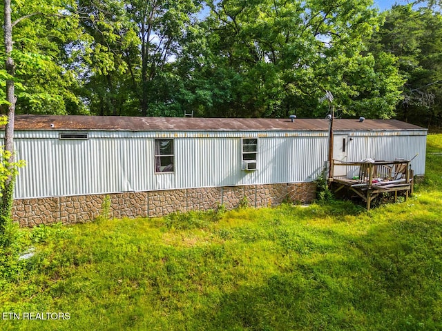 9217 Kodak Rd, Kodak, TN 37764 - view of side of property with a wooden deck and cooling unit