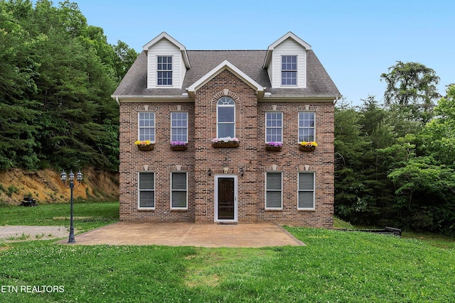 4914 Circle Rd, Corryton, TN 37721 - view of front of property featuring a patio area, a front lawn, and brick siding