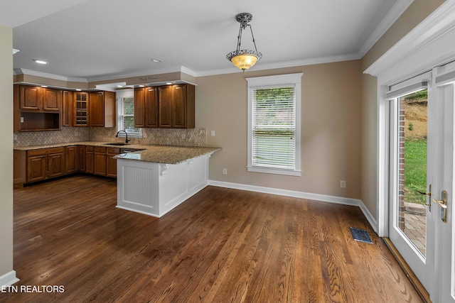 4914 Circle Rd, Corryton, TN 37721 - kitchen with a sink, a peninsula, tasteful backsplash, dark wood finished floors, and crown molding