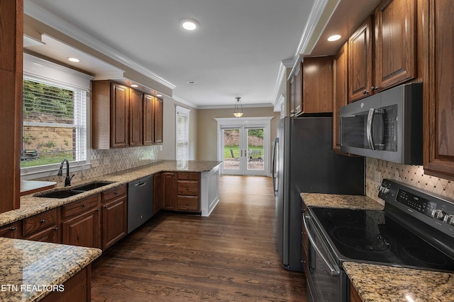 4914 Circle Rd, Corryton, TN 37721 - kitchen with stainless steel appliances, a sink, ornamental molding, french doors, and a peninsula