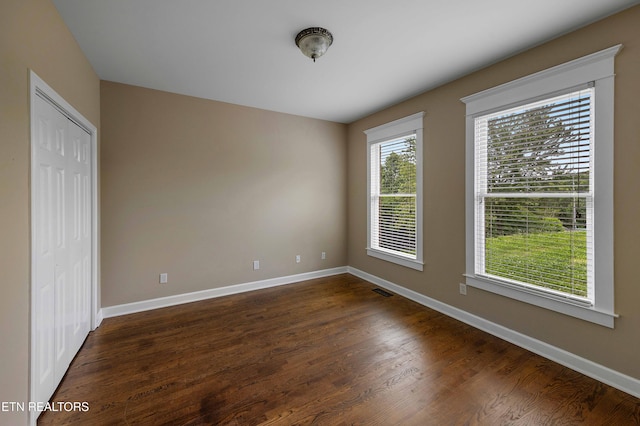 4914 Circle Rd, Corryton, TN 37721 - unfurnished room with baseboards and dark wood finished floors