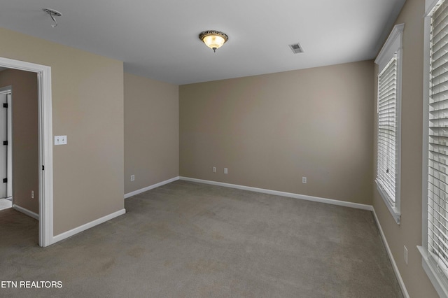 4914 Circle Rd, Corryton, TN 37721 - carpeted empty room featuring baseboards and plenty of natural light