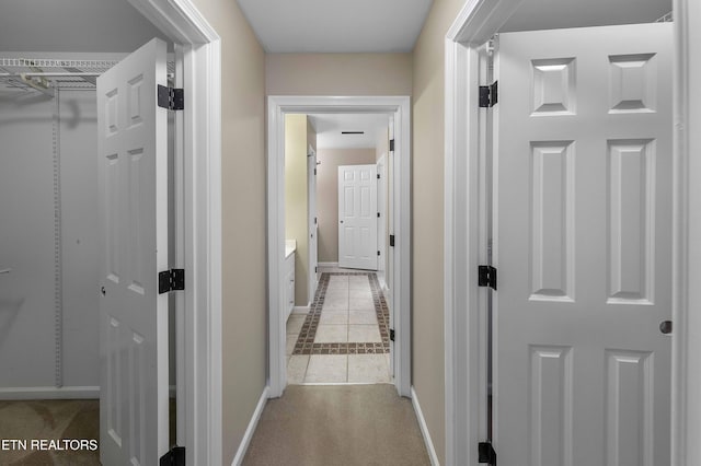 4914 Circle Rd, Corryton, TN 37721 - corridor with tile patterned flooring, baseboards, and carpet flooring