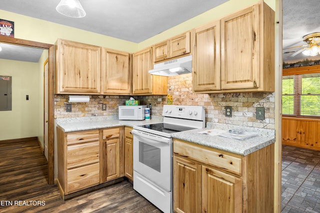 3305 Leonard Huskey Ln, Pigeon Forge, TN 37863 - kitchen featuring under cabinet range hood, white appliances, light brown cabinets, electric panel, and backsplash