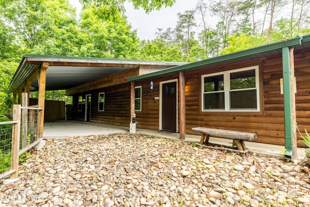 3305 Leonard Huskey Ln, Pigeon Forge, TN 37863 - view of front facade featuring log veneer siding