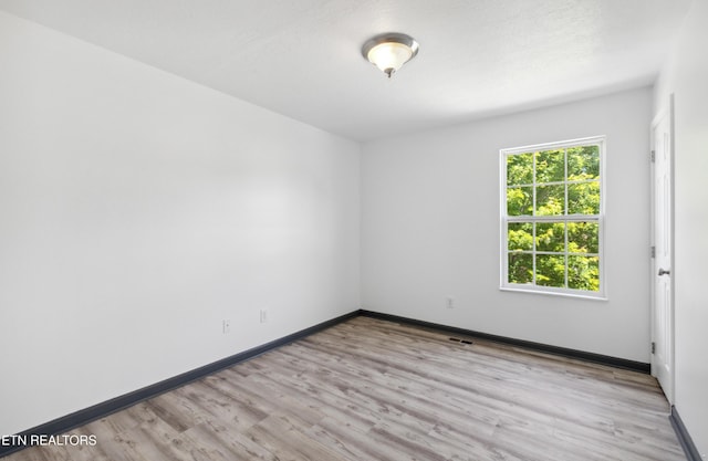 6108 Burlwood Rd, Knoxville, TN 37921 - spare room with light wood-type flooring and baseboards